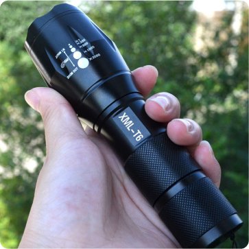 VitalTac Flashlight held outdoors